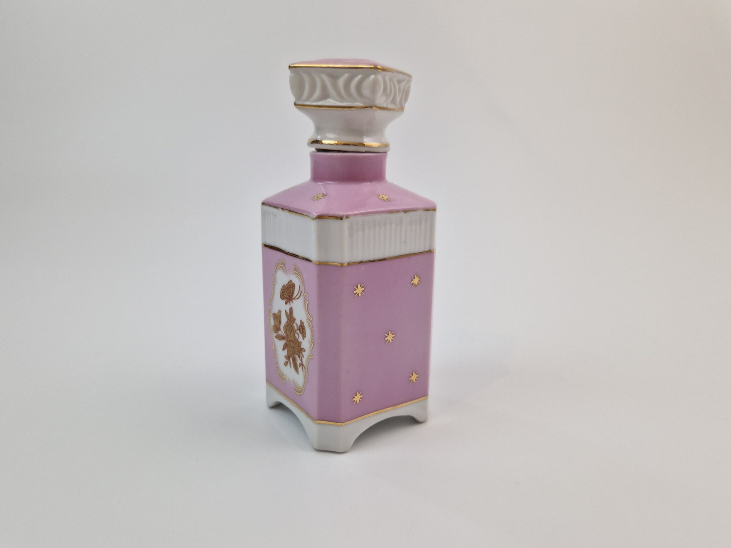 Vintage porseleinen parfumfles roze