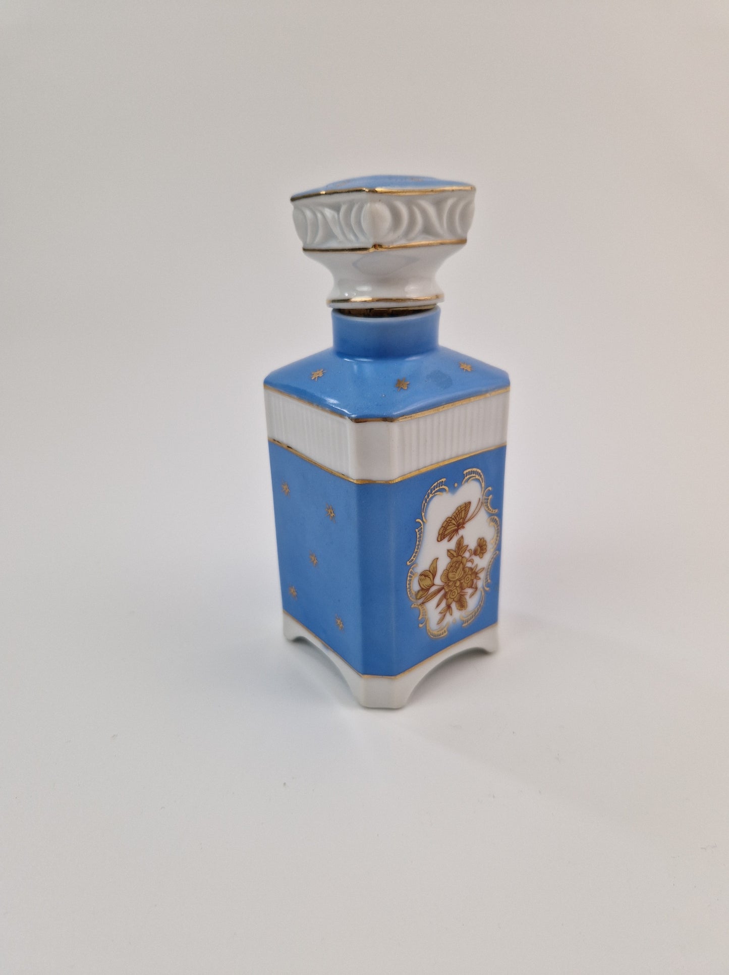 Vintage porseleinen parfumfles roze