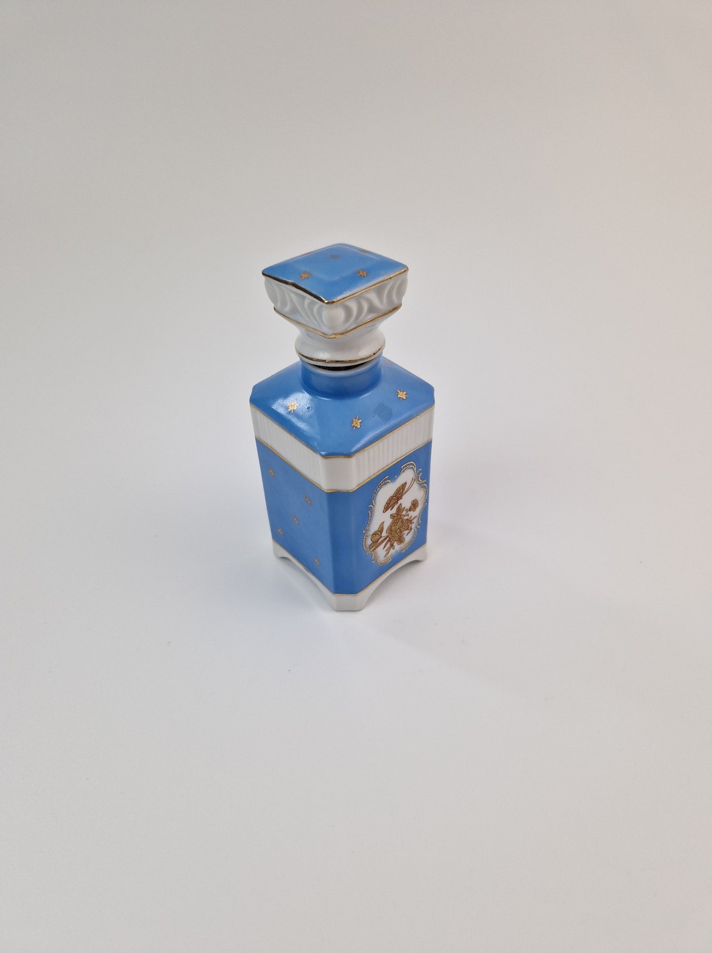 Vintage porseleinen parfumfles roze