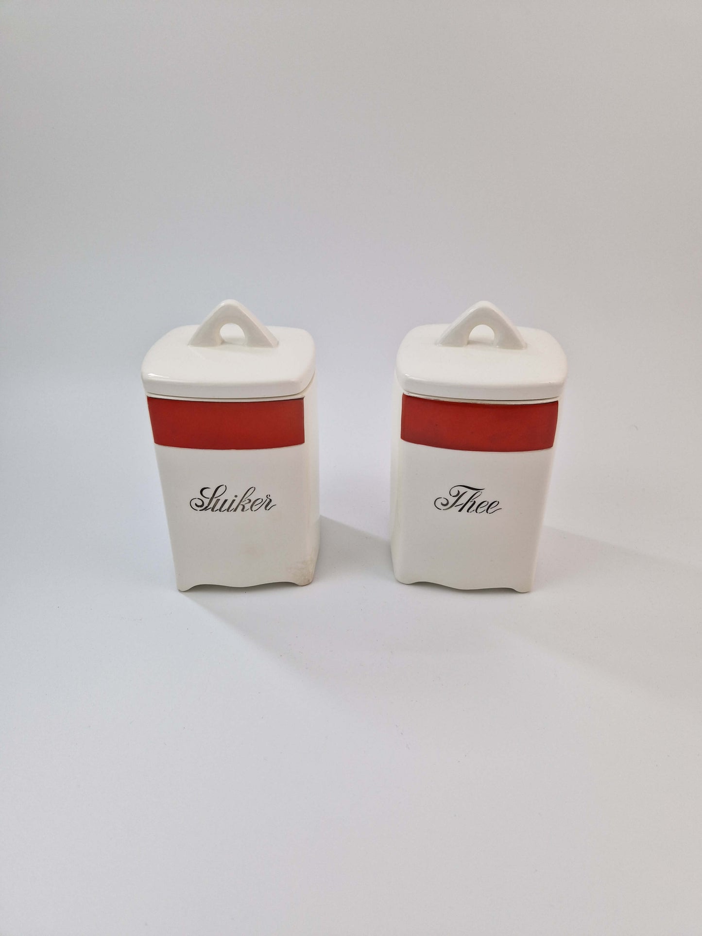 Twee voorraadpotten suiker en thee vintage