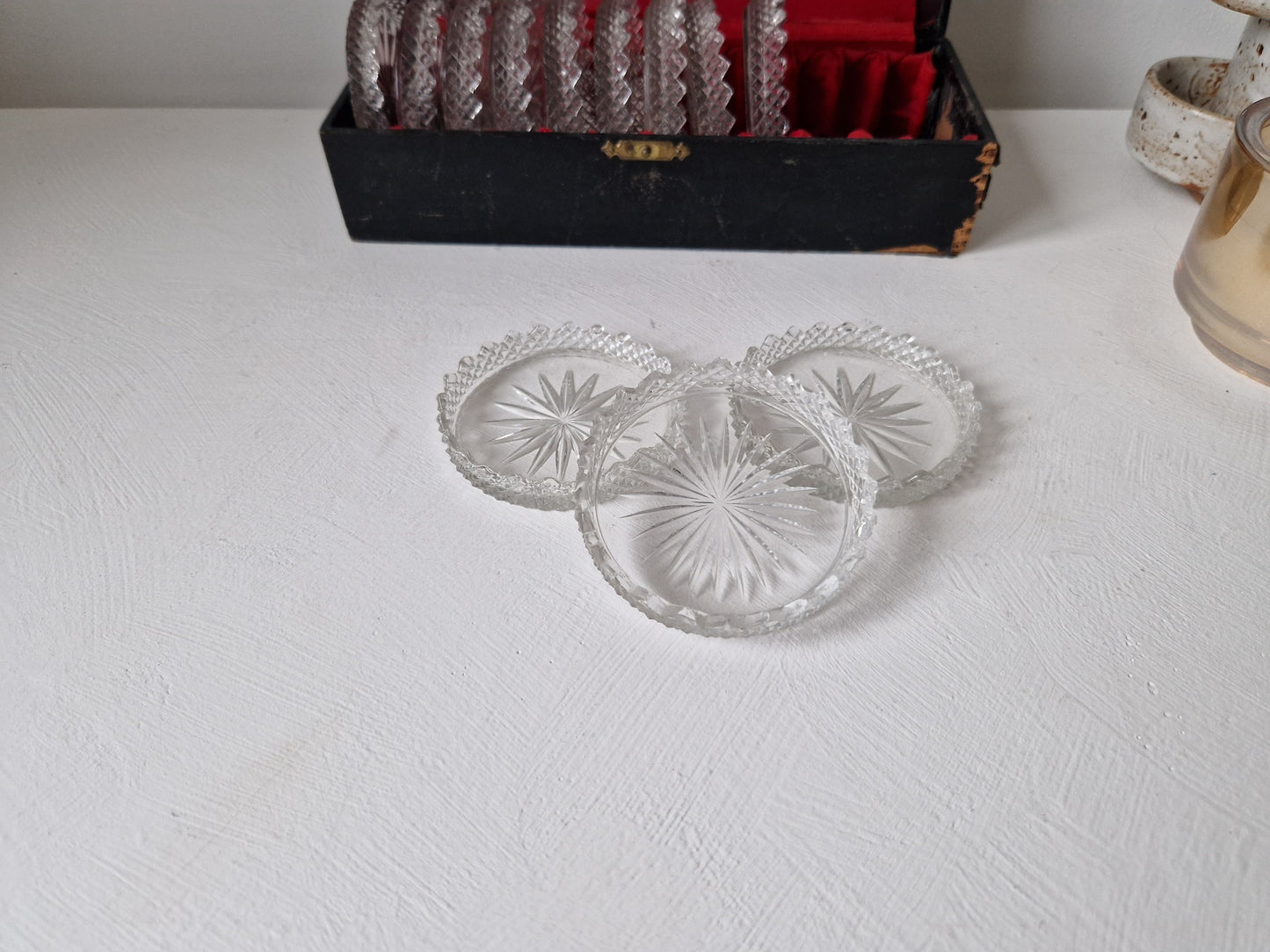Set van 12 vintage kristallen onderzetters webshop