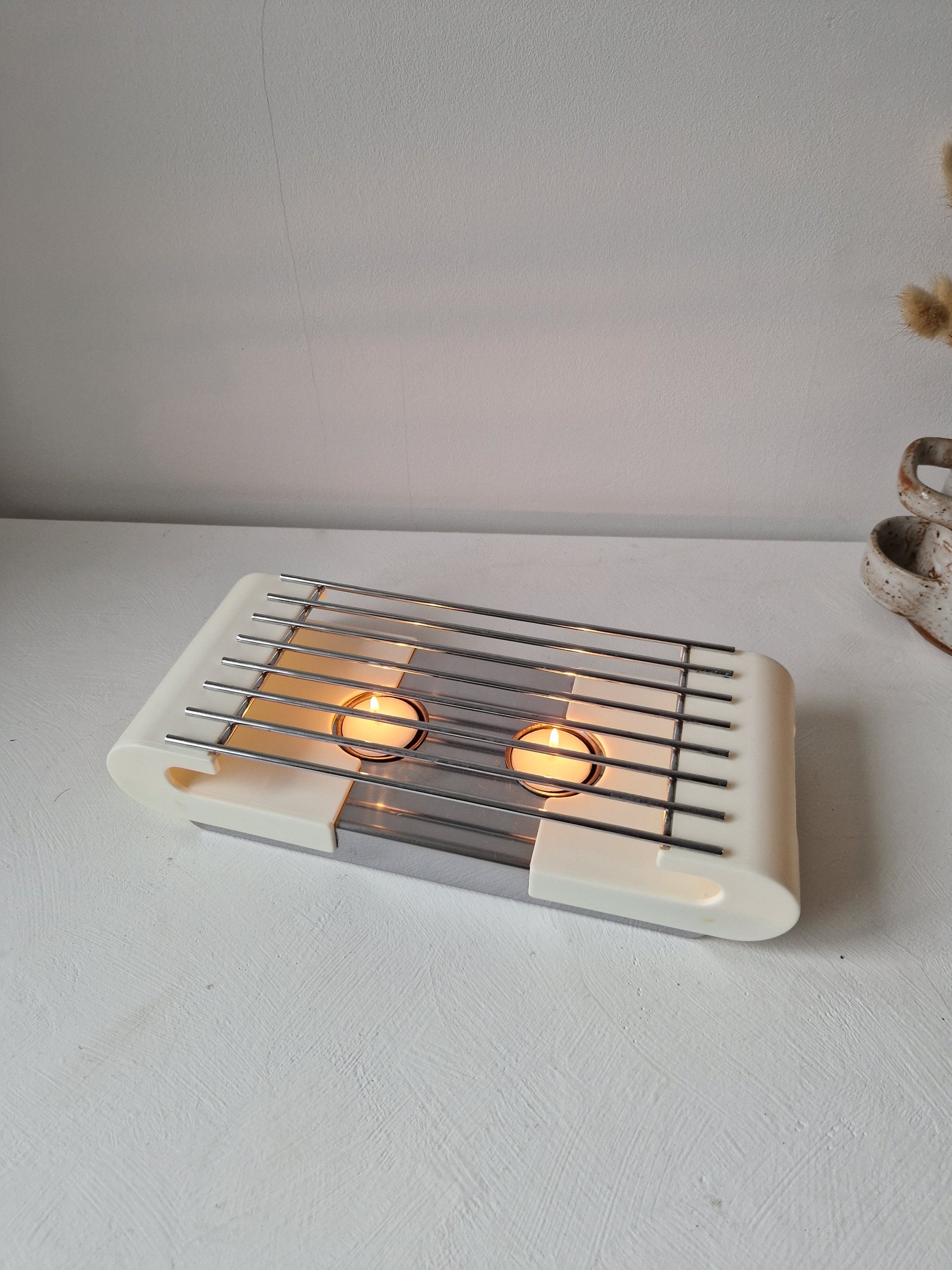 Vintage warmhoudplaat met waxinelichtjes