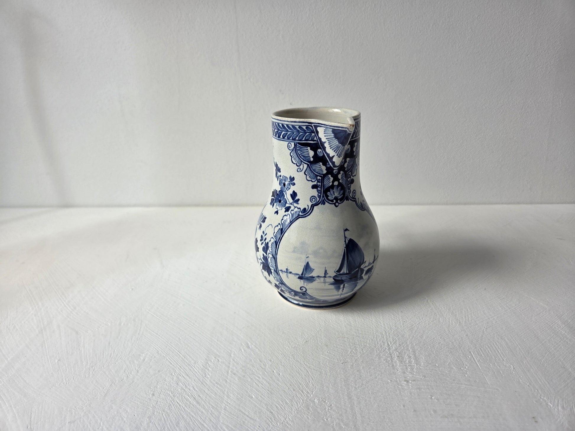 antieke kan met tuit en oor