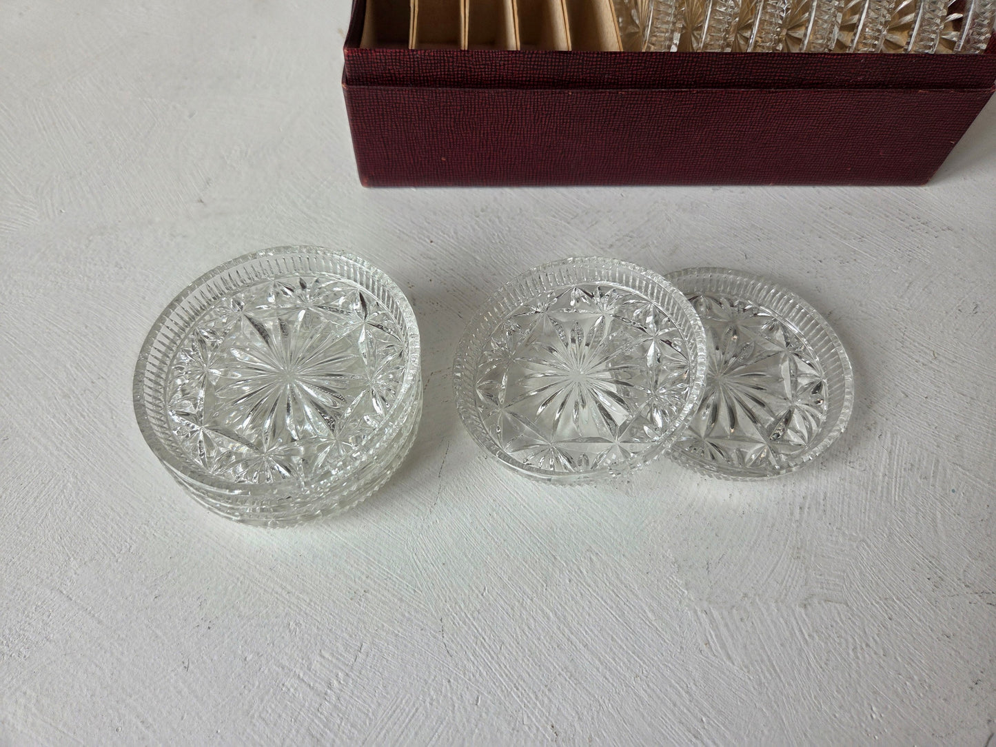 Set van twaalf vintage onderzetters – jaren 50 glaswerk D’Antan collectie