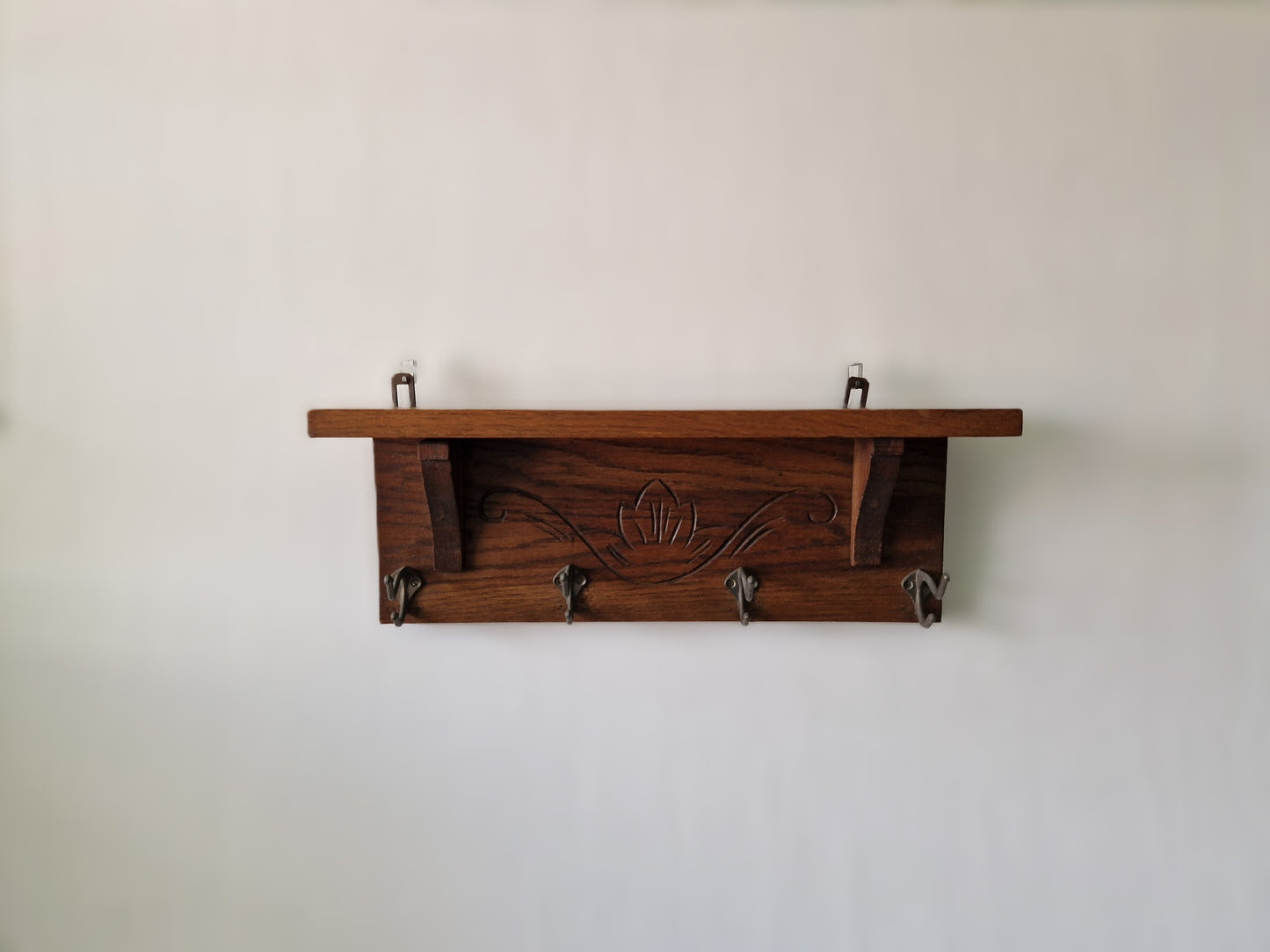 antiek kapstok muur