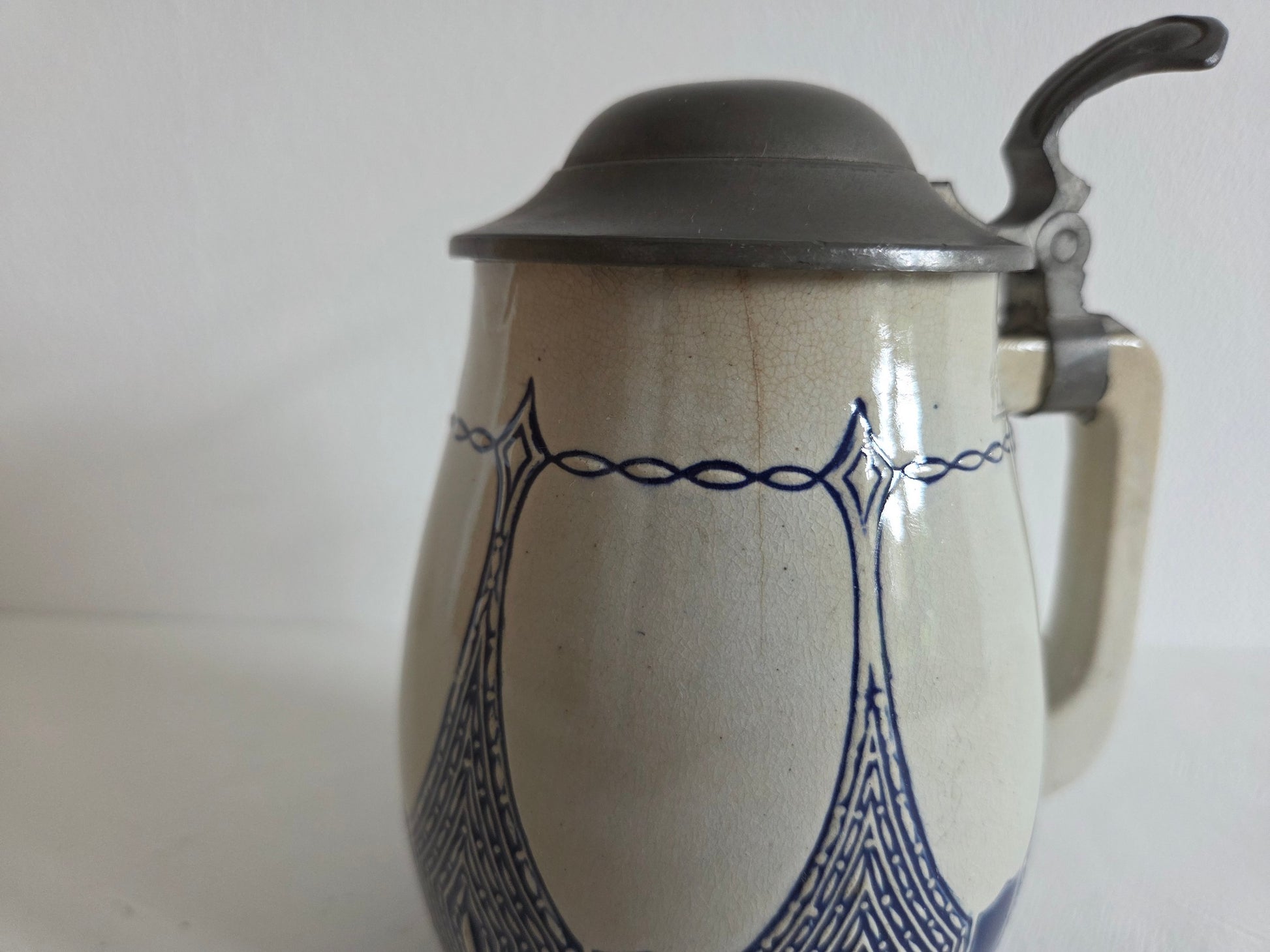 steengoed bierpul Dümler Breiden Art Nouveau blauw wit