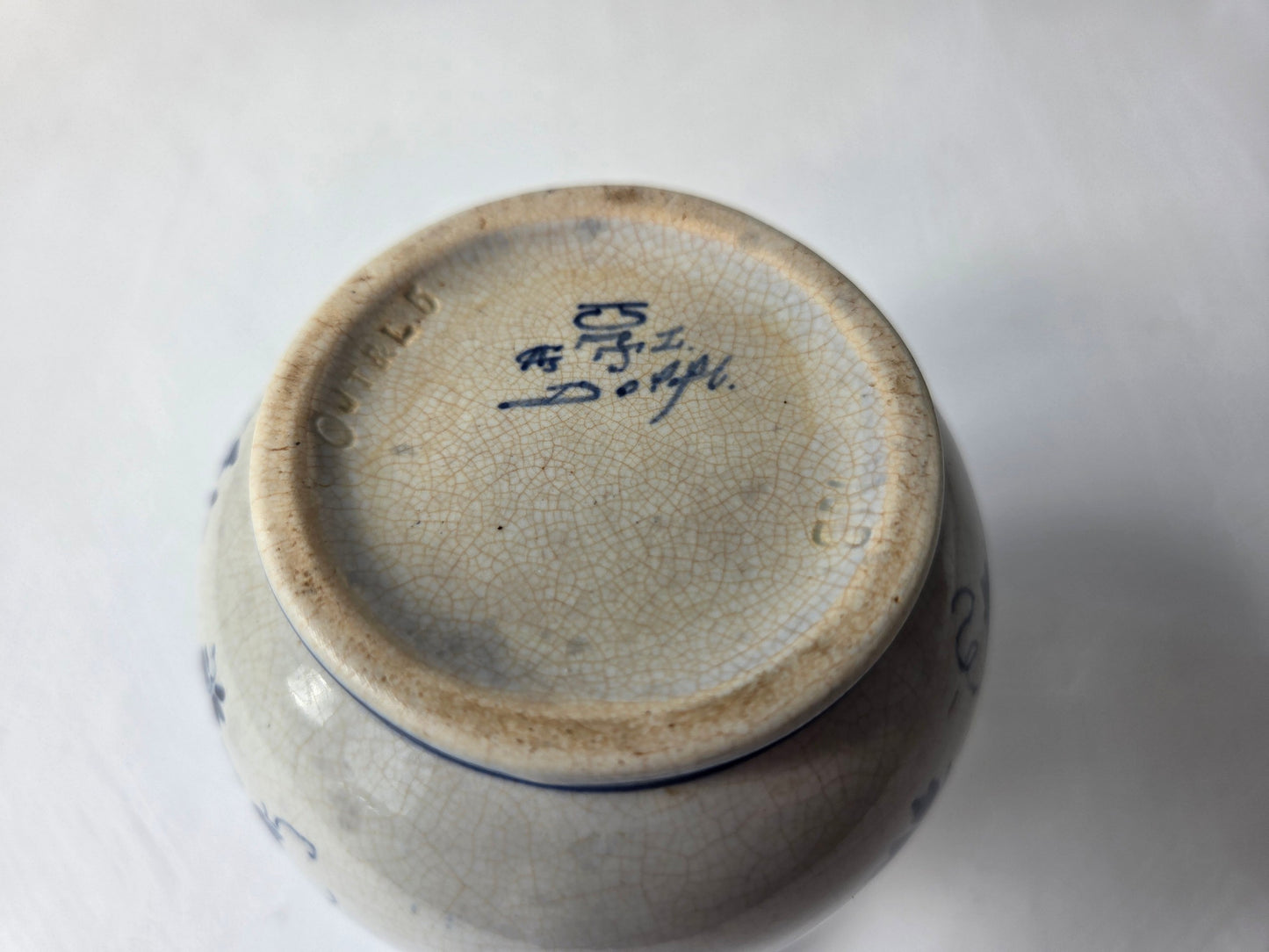 handbeschilderde Royal Delft schenkkan uit 1890