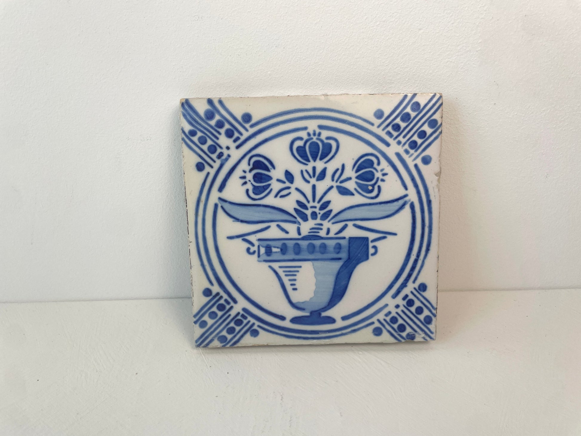 Set van vier antieke bloemvaastegels ca. 1890–1910