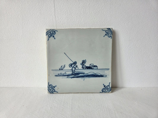 handgeschilderde blauwe tegel Makkum visser zeilschip
