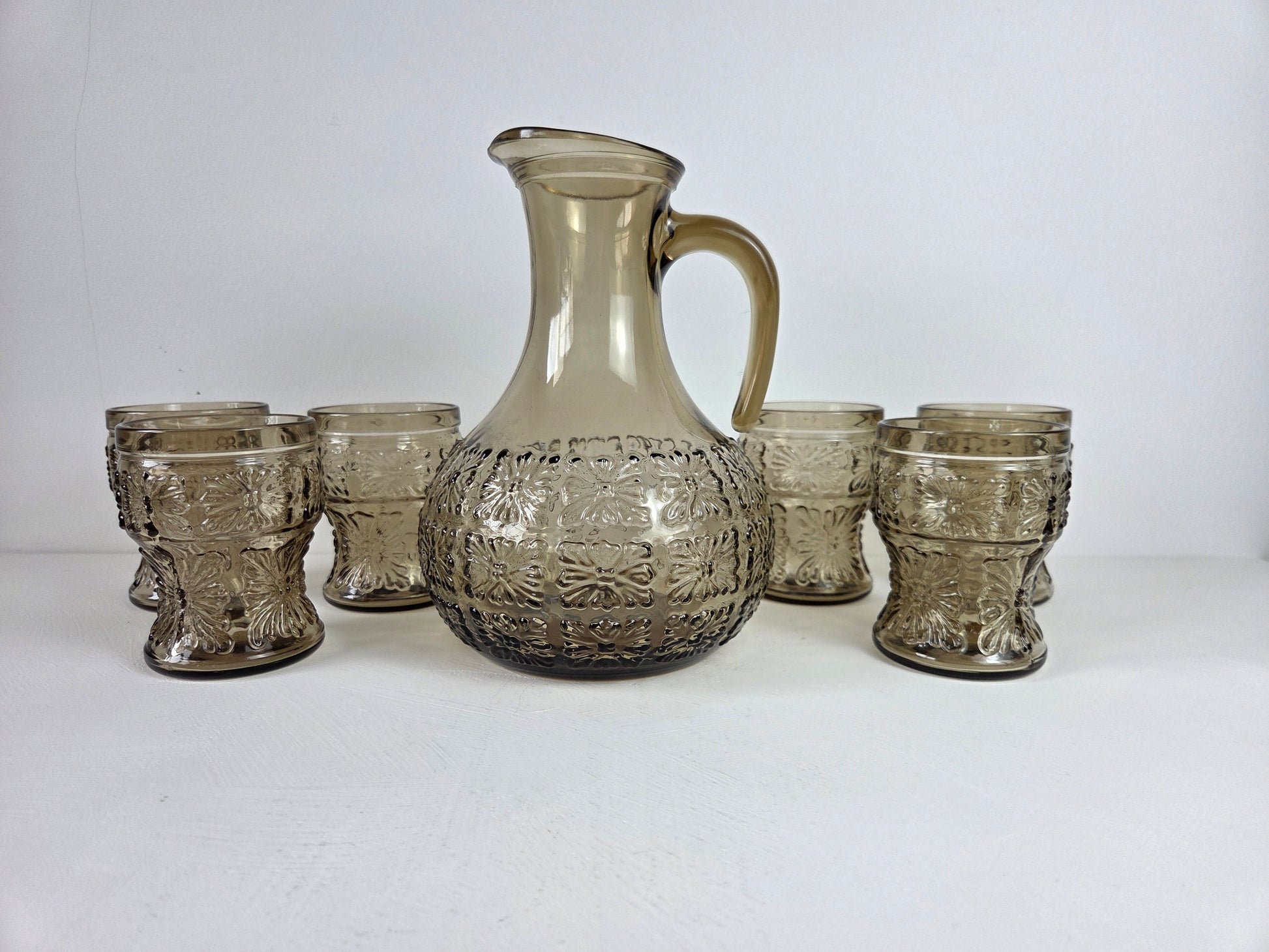 Vintage glazenset met schenkkan en zes glazen mid century