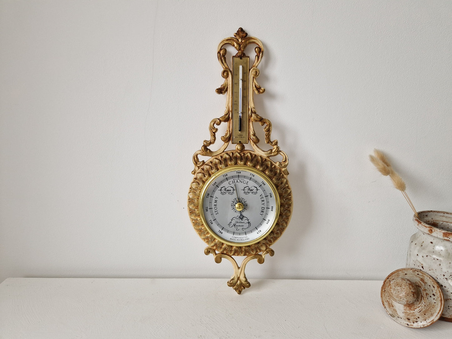 Goudkleurige barometer van Shortland Manchester