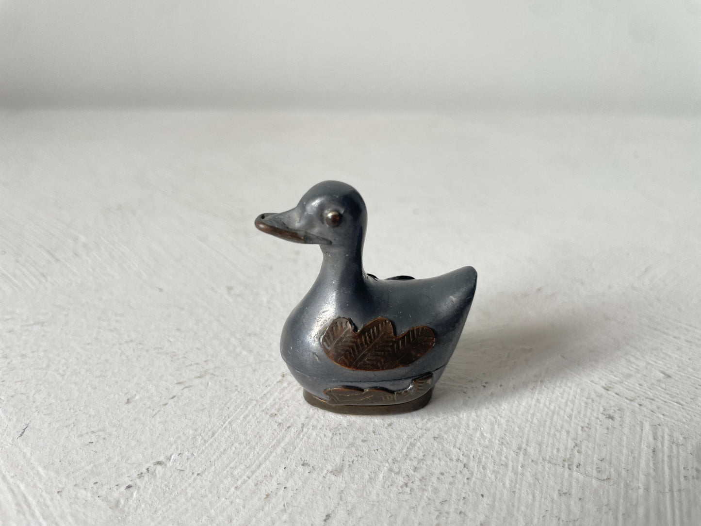 vintage miniatuur eend poppenhuis
