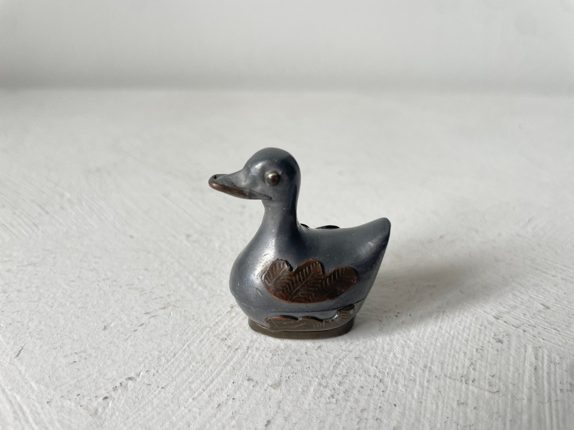 vintage miniatuur eend poppenhuis