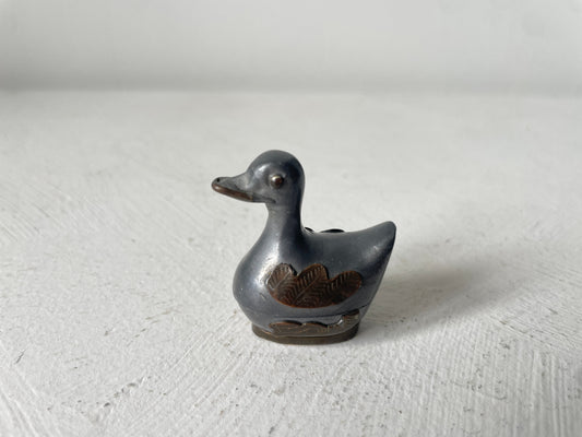 vintage miniatuur eend poppenhuis
