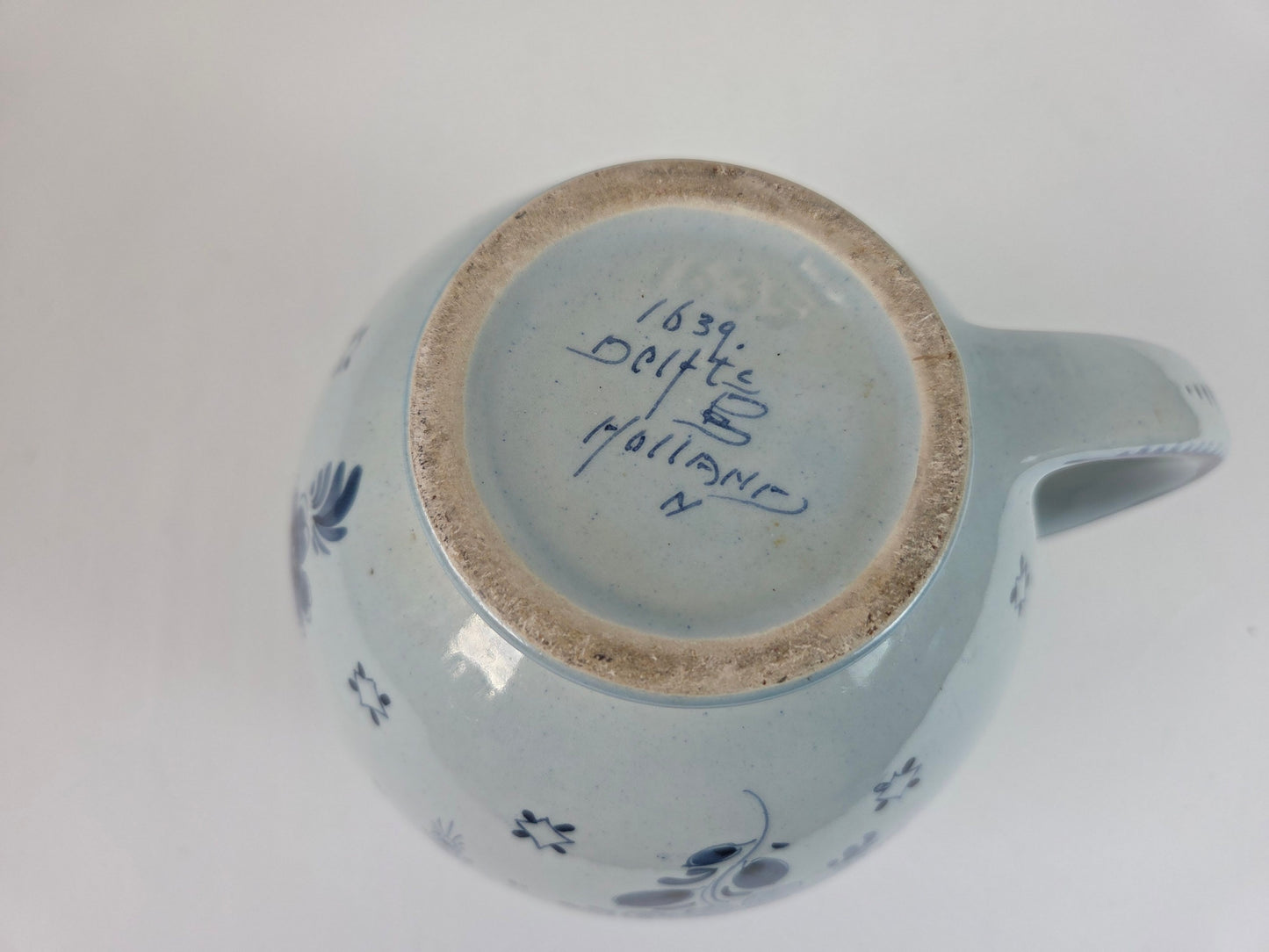 Schoonhoven kan met bloemmotief