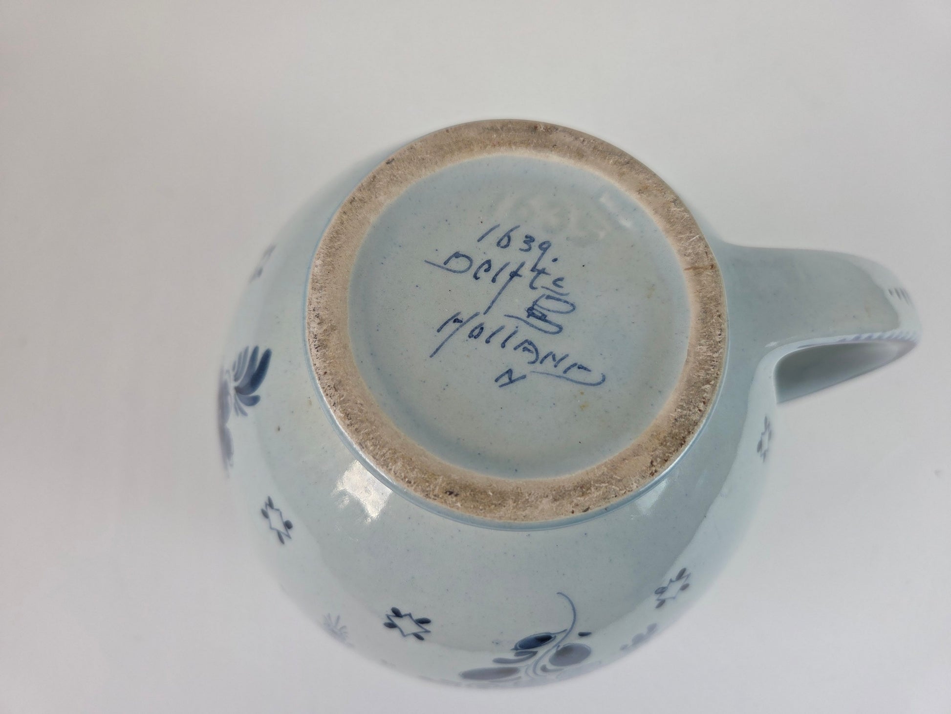 Schoonhoven kan met bloemmotief