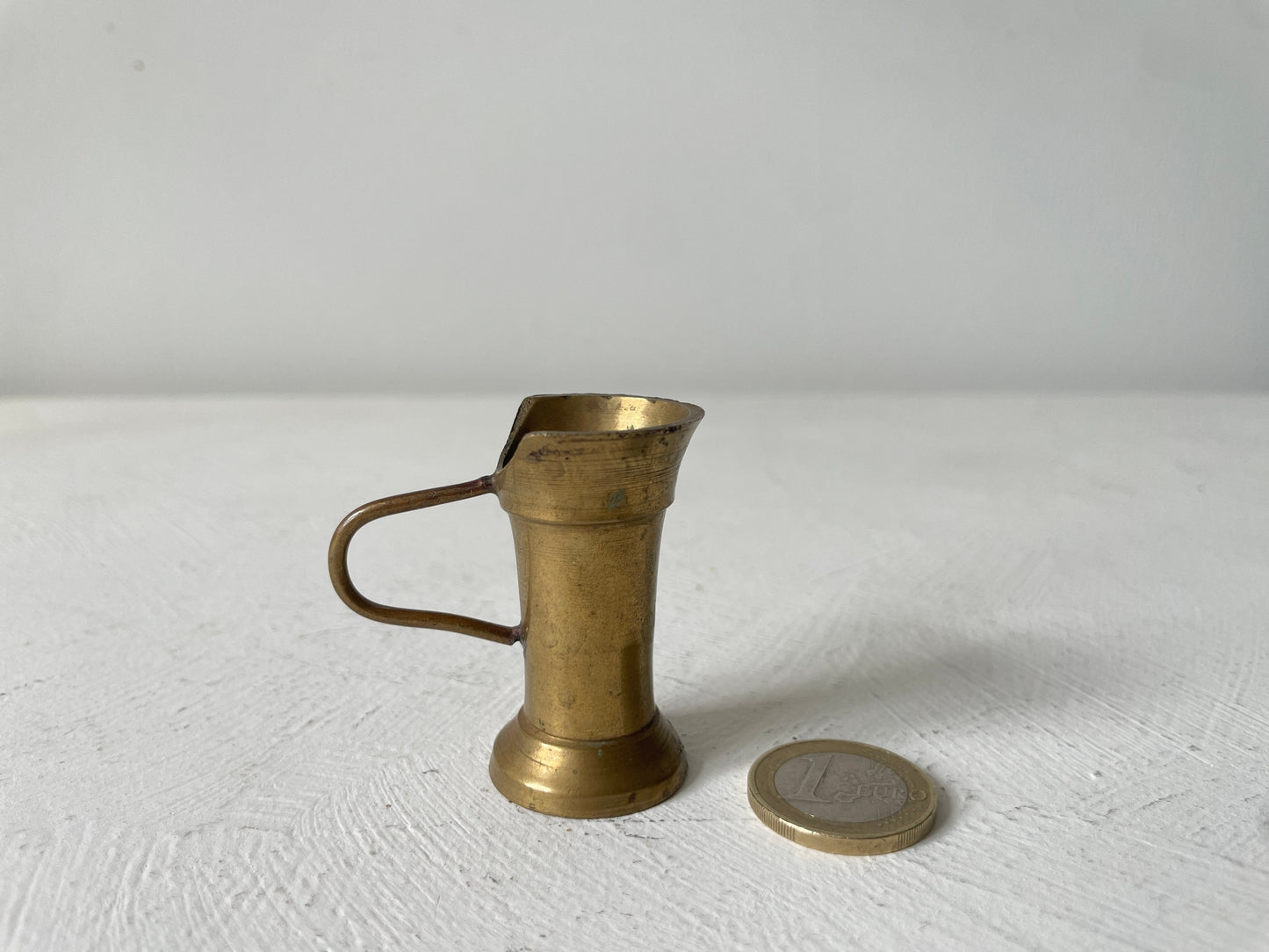 messing miniatuur met oortje