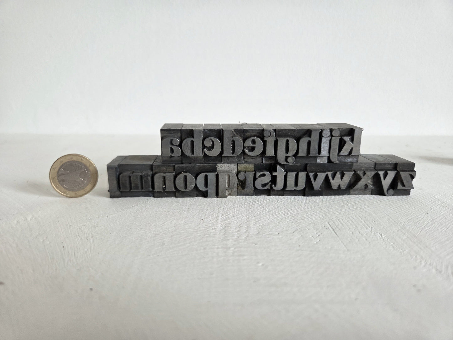 vintage loden letters drukkerij alfabet spiegelbeeld