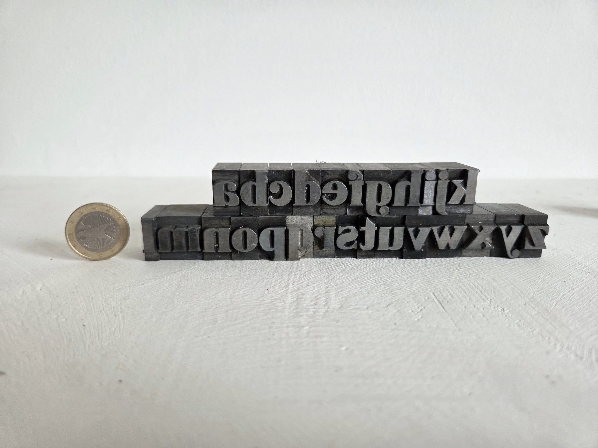vintage loden letters drukkerij alfabet spiegelbeeld