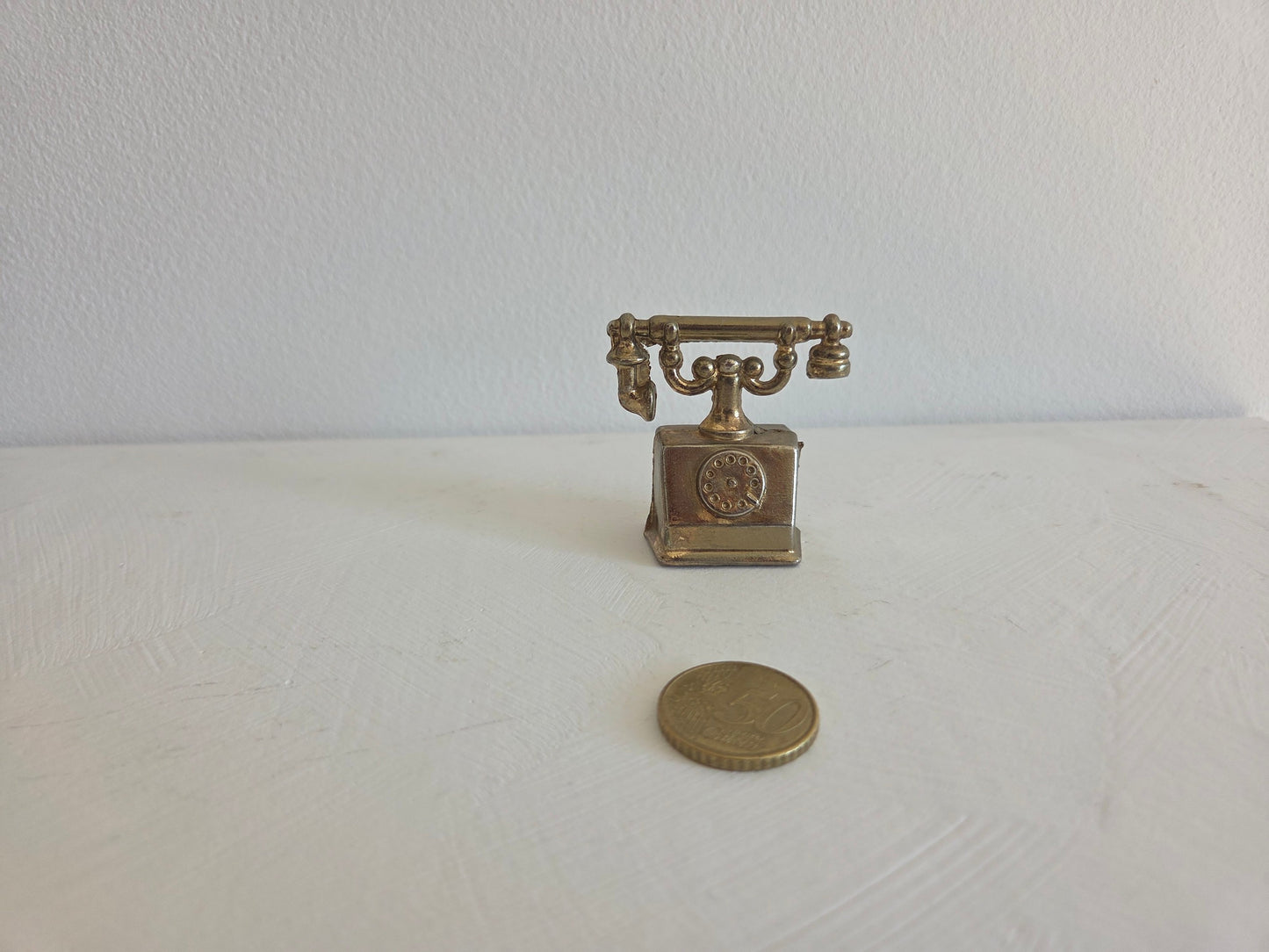 miniatuur telefoon met gebogen hoornsteun