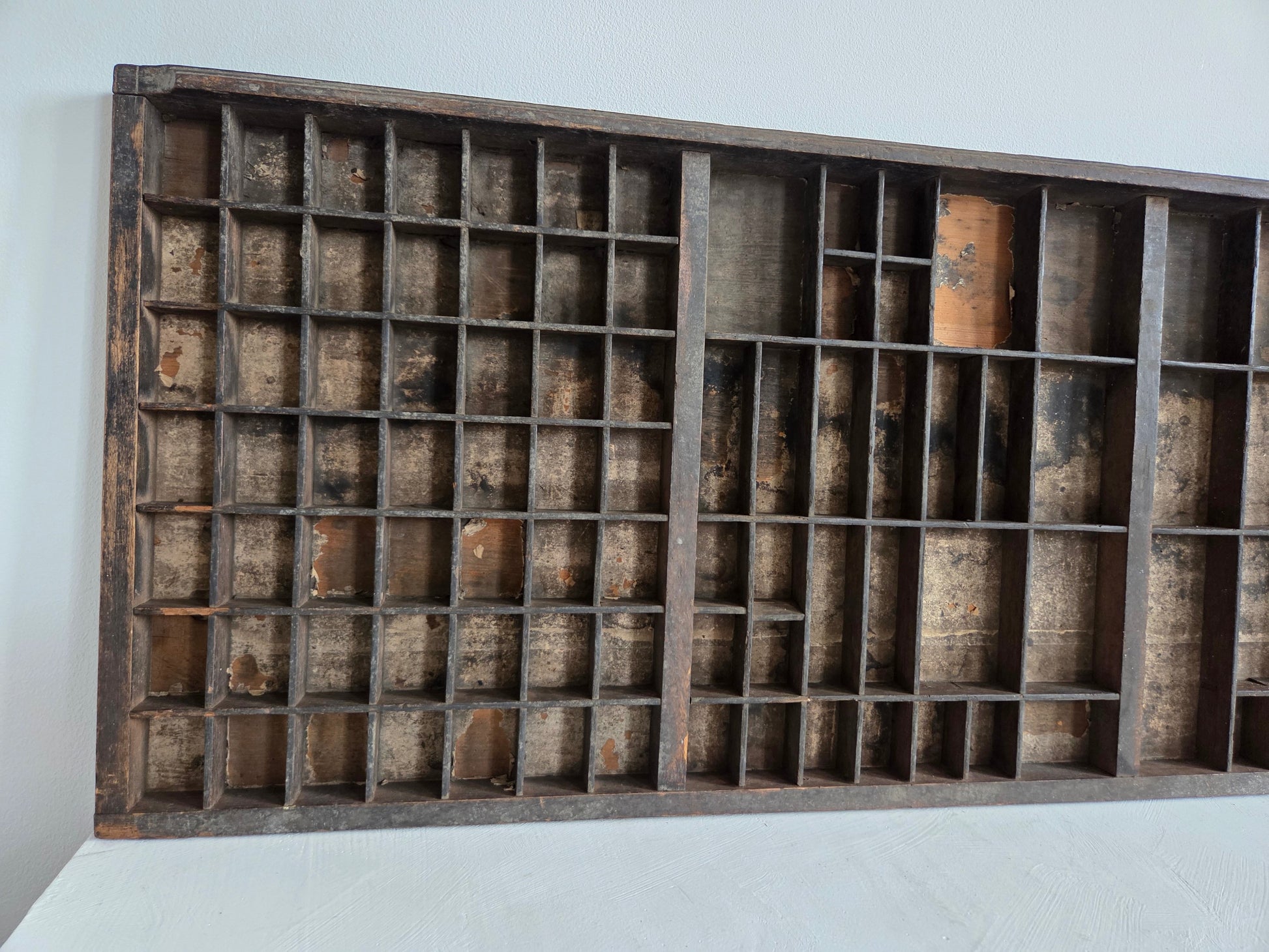 houten bak met beschadigd vakje middenboven